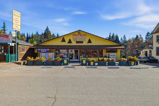 a backyard of a house with lots of green space