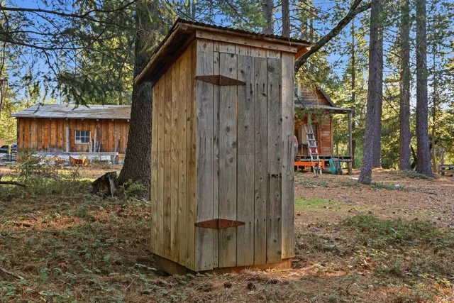 a backyard of a house with lots of green space