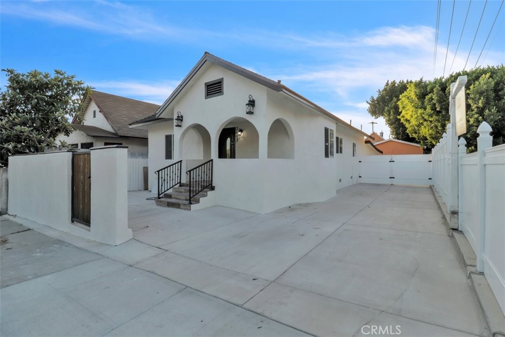 2697 Merced Street Los Angeles, CA 90065 - Photo 2 of 10 a view of a house with a yard