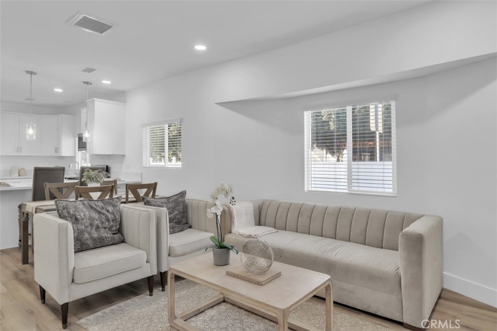 2697 Merced Street Los Angeles, CA 90065 - Photo 5 of 10 a living room with furniture and a large window