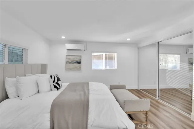 a bed room with a bed and a couch