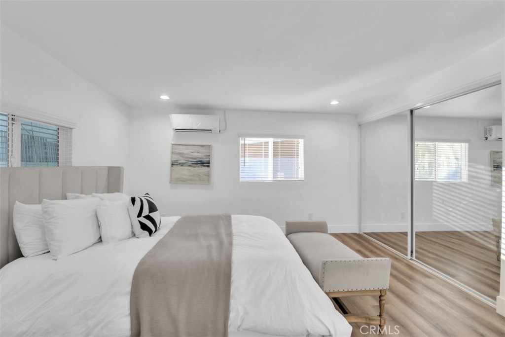 2697 Merced Street Los Angeles, CA 90065 - Photo 9 of 10 a bed room with a bed and a couch