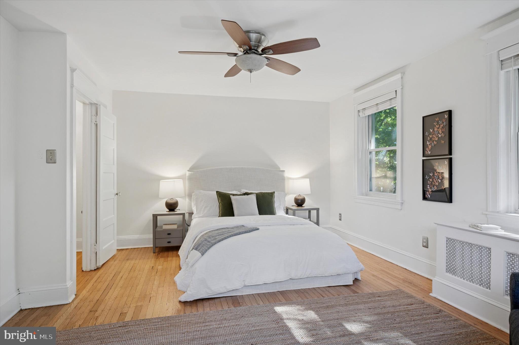 525 Burnham Road Philadelphia, PA 19119 - Photo 19 of 36 a bedroom with a large bed and a window