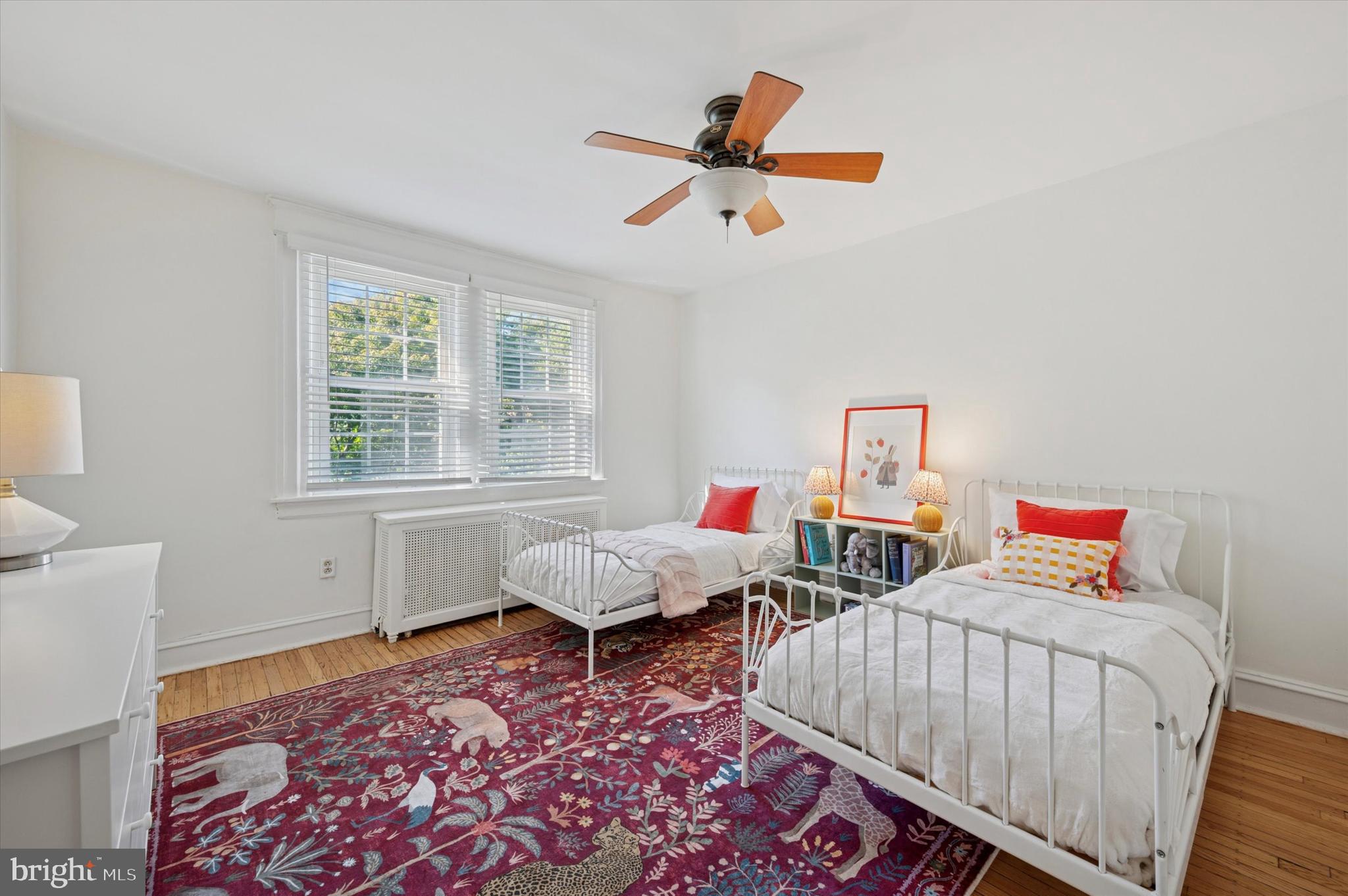 525 Burnham Road Philadelphia, PA 19119 - Photo 21 of 36 a bedroom with two beds and a window