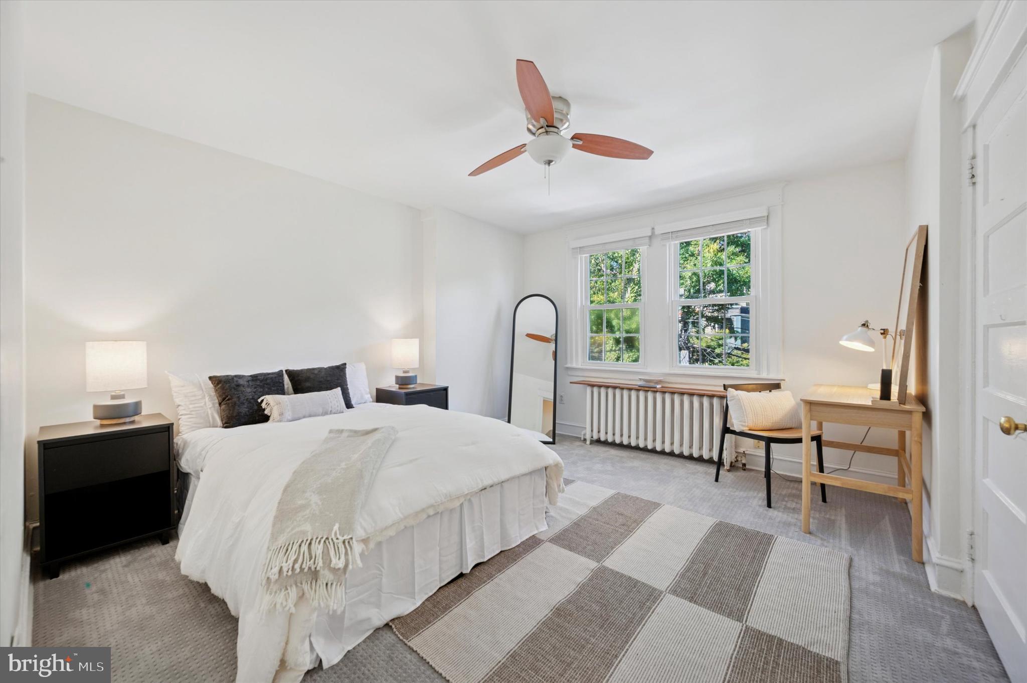 525 Burnham Road Philadelphia, PA 19119 - Photo 23 of 36 a bedroom with bed and a large window
