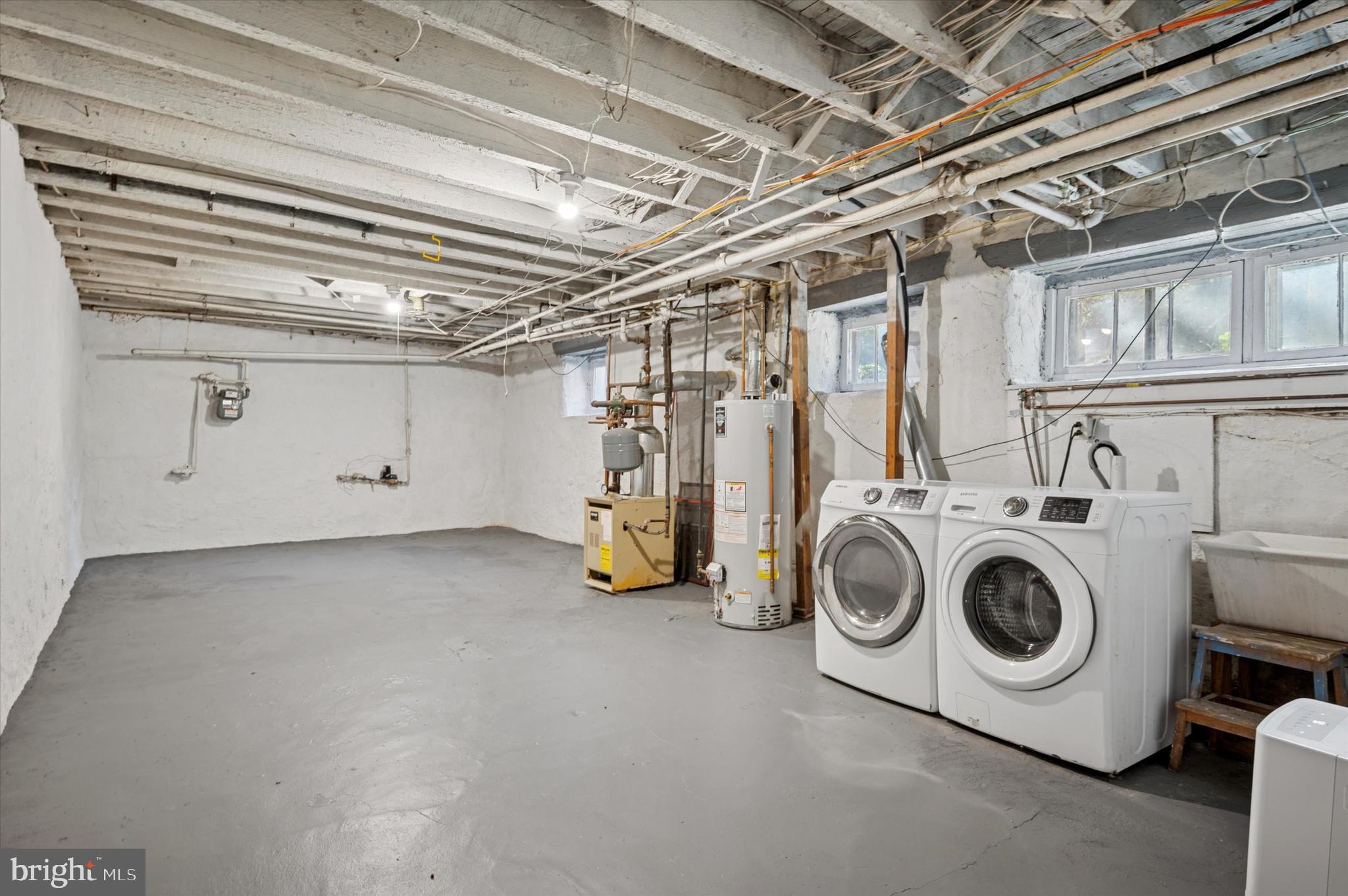 525 Burnham Road Philadelphia, PA 19119 - Photo 28 of 36 a utility room with dryer and washer