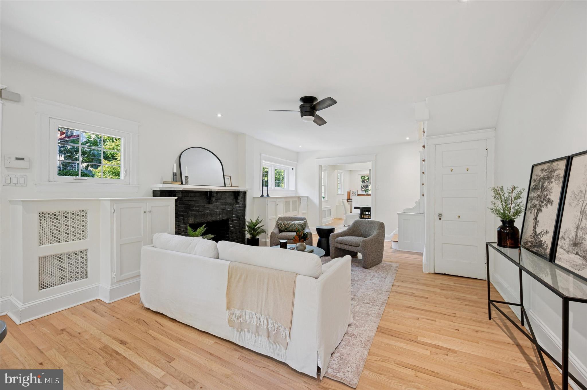 525 Burnham Road Philadelphia, PA 19119 - Photo 6 of 36 a living room with furniture and a fireplace