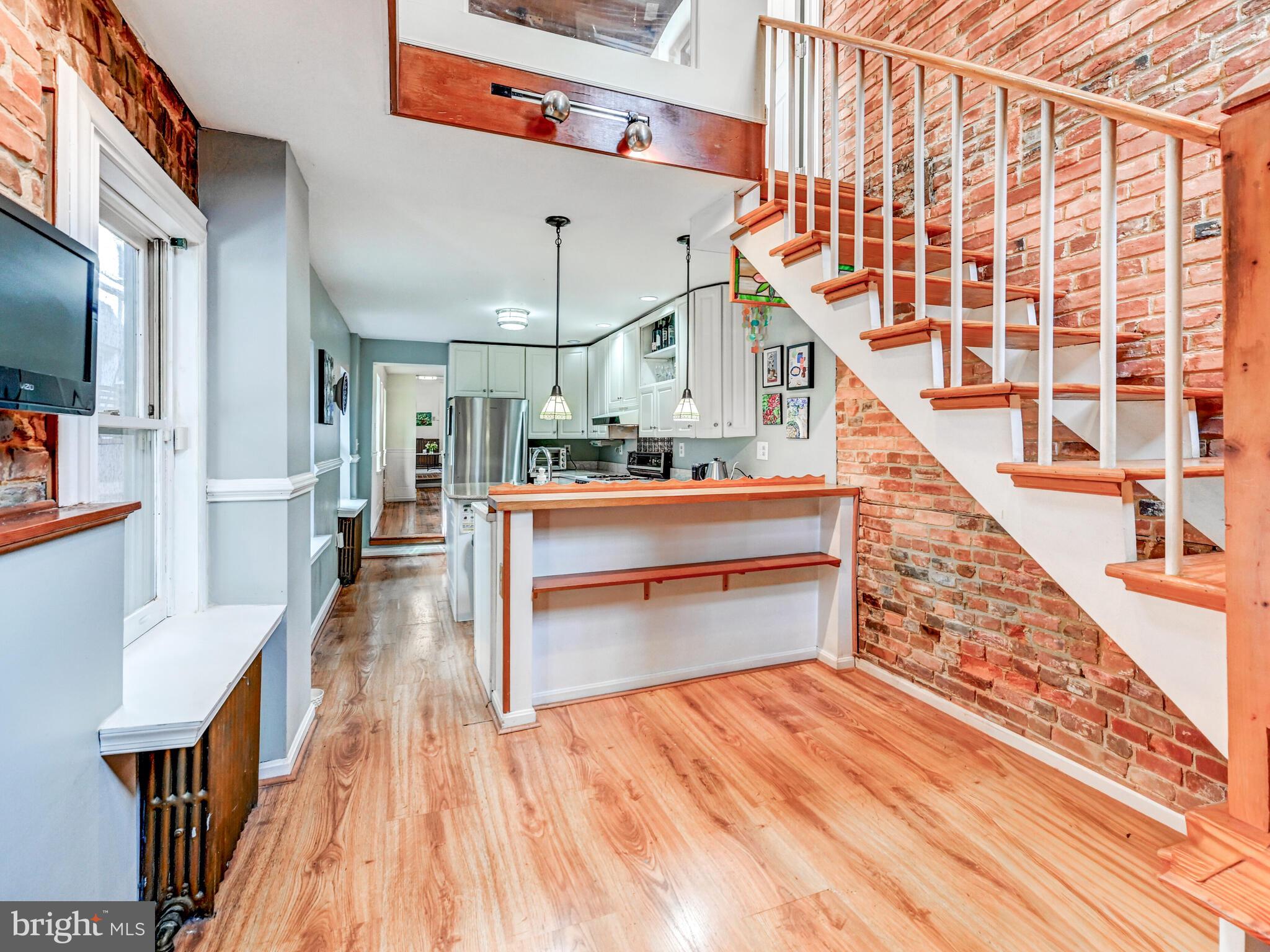 2013 Bank Street Baltimore, MD 21231 - Photo 16 of 38 a view of entryway and hall with wooden floor