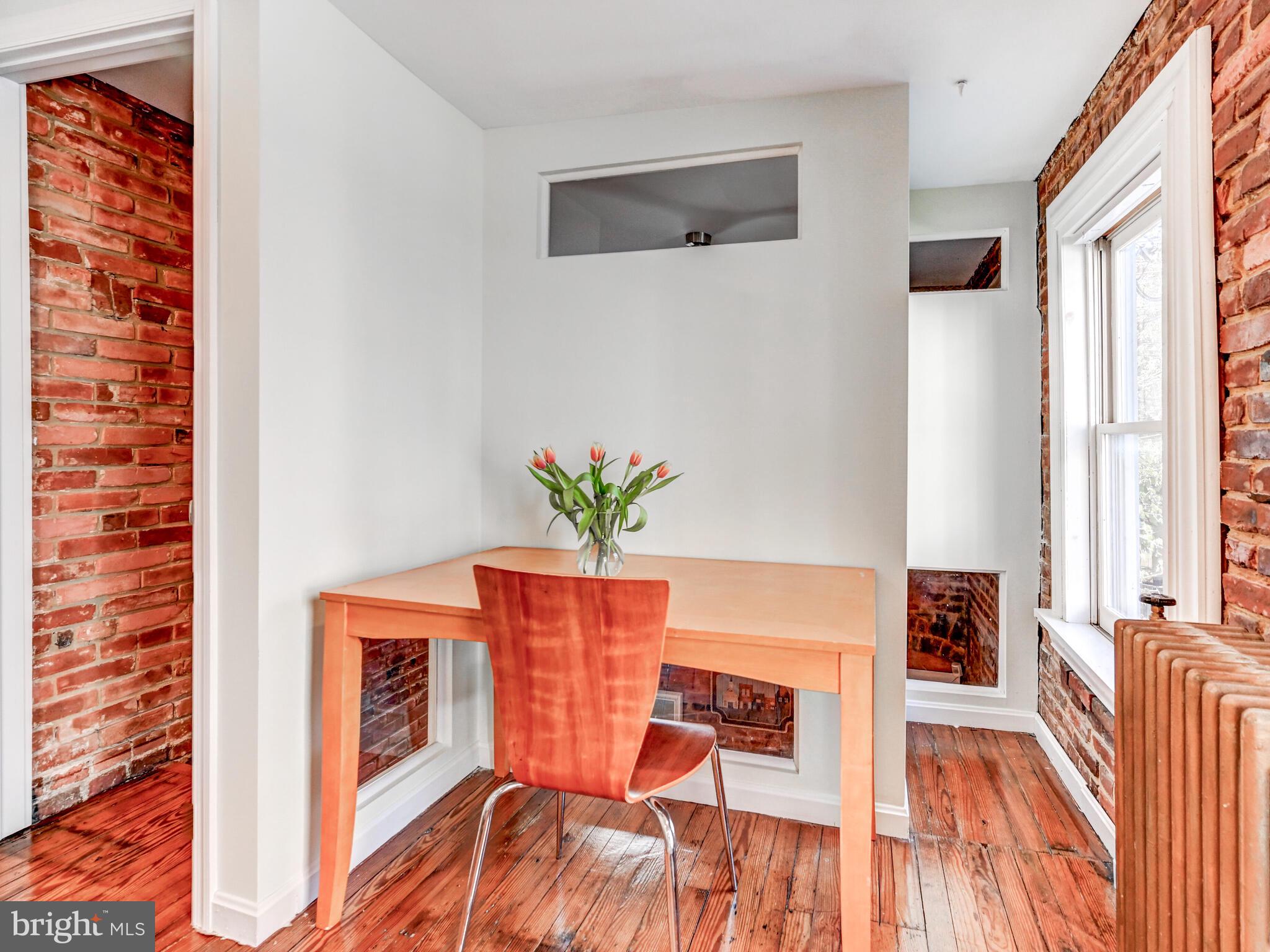 2013 Bank Street Baltimore, MD 21231 - Photo 20 of 38 a view of a workspace with furniture and wooden floor