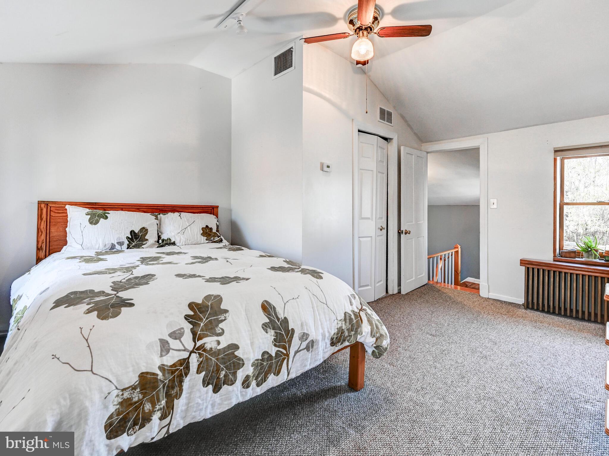 2013 Bank Street Baltimore, MD 21231 - Photo 30 of 38 a bedroom with a bed and window