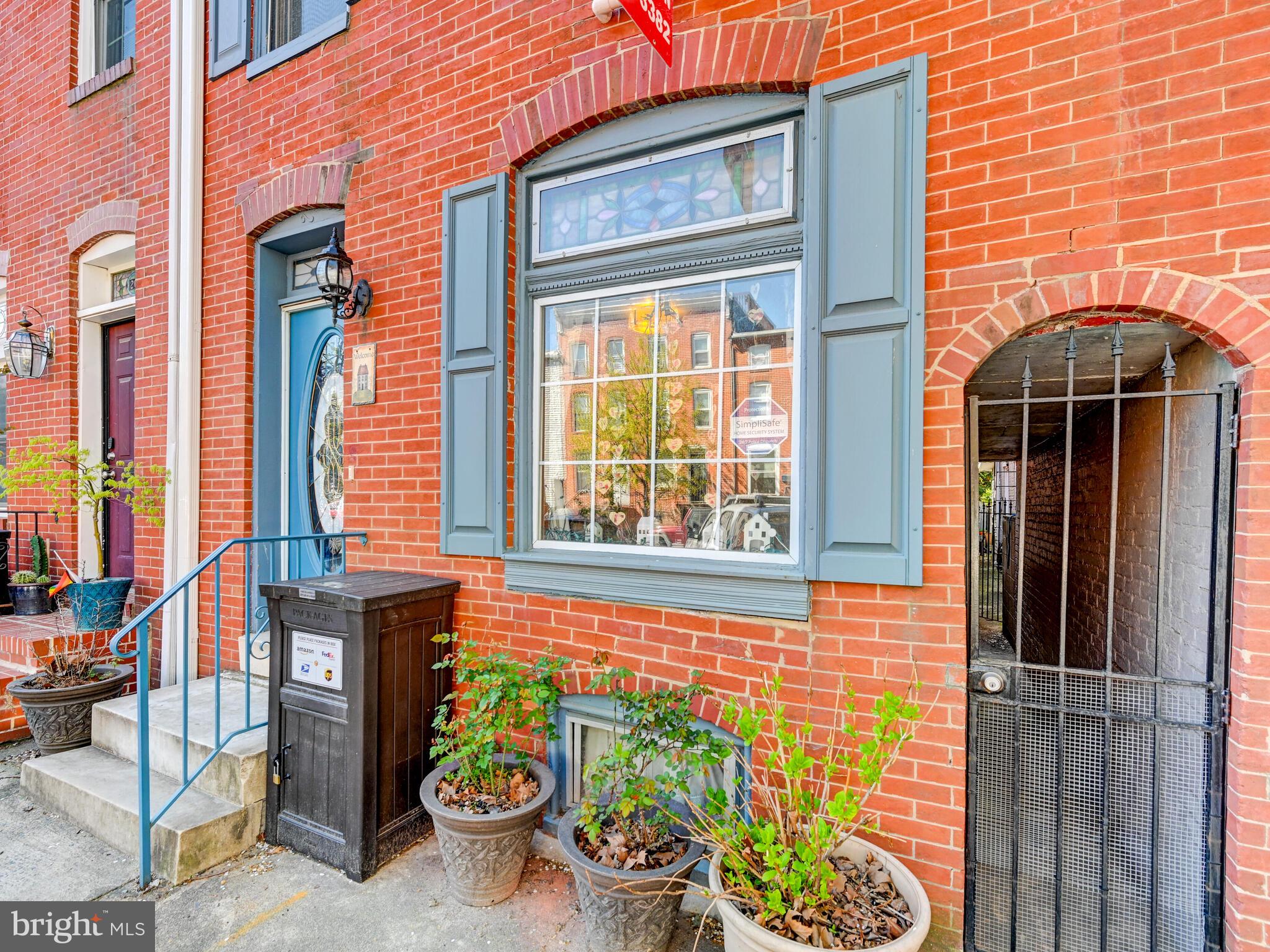 2013 Bank Street Baltimore, MD 21231 - Photo 3 of 38 a front view of a house