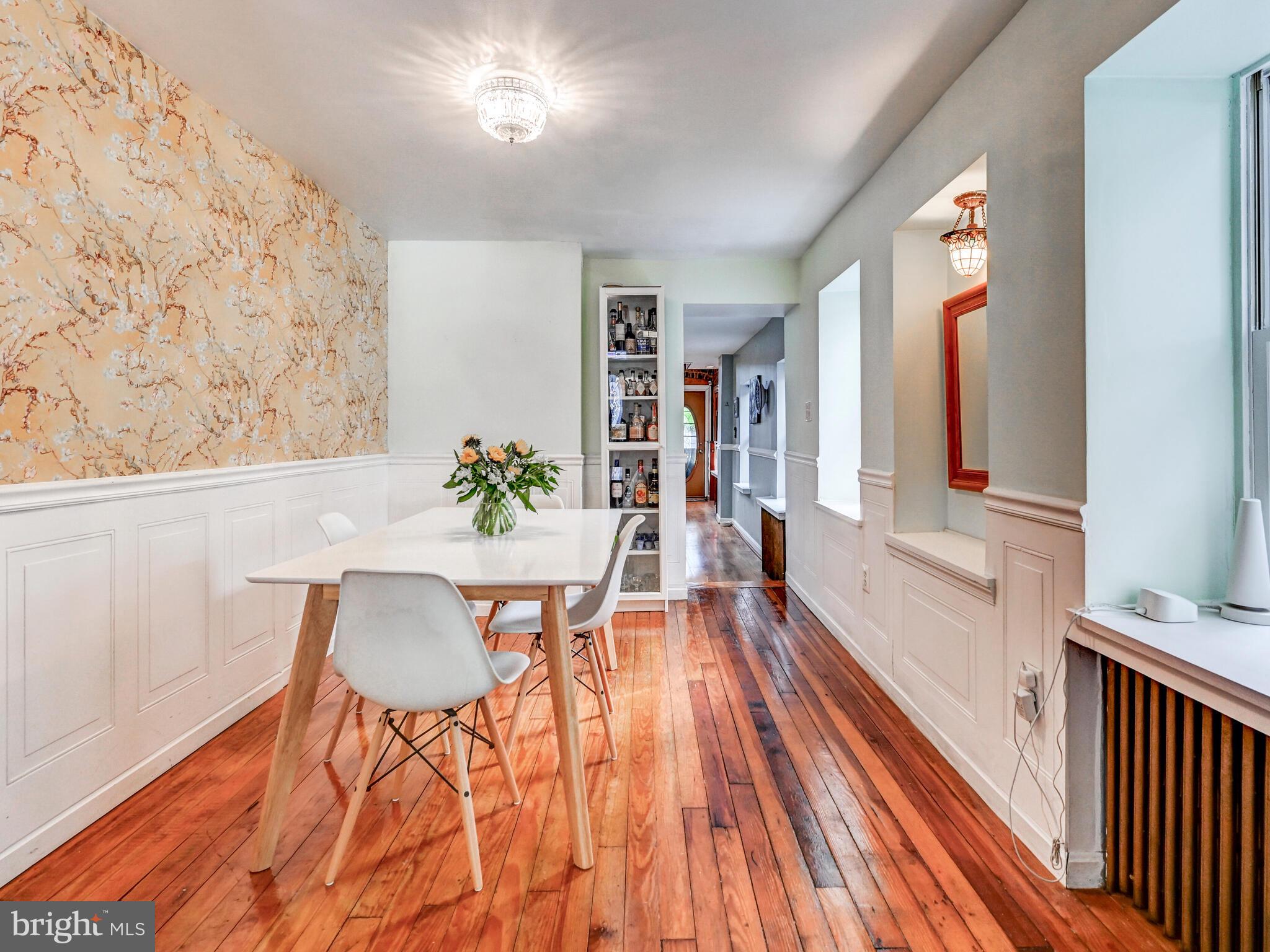 2013 Bank Street Baltimore, MD 21231 - Photo 8 of 38 a view of a dining room with furniture window and wooden floor