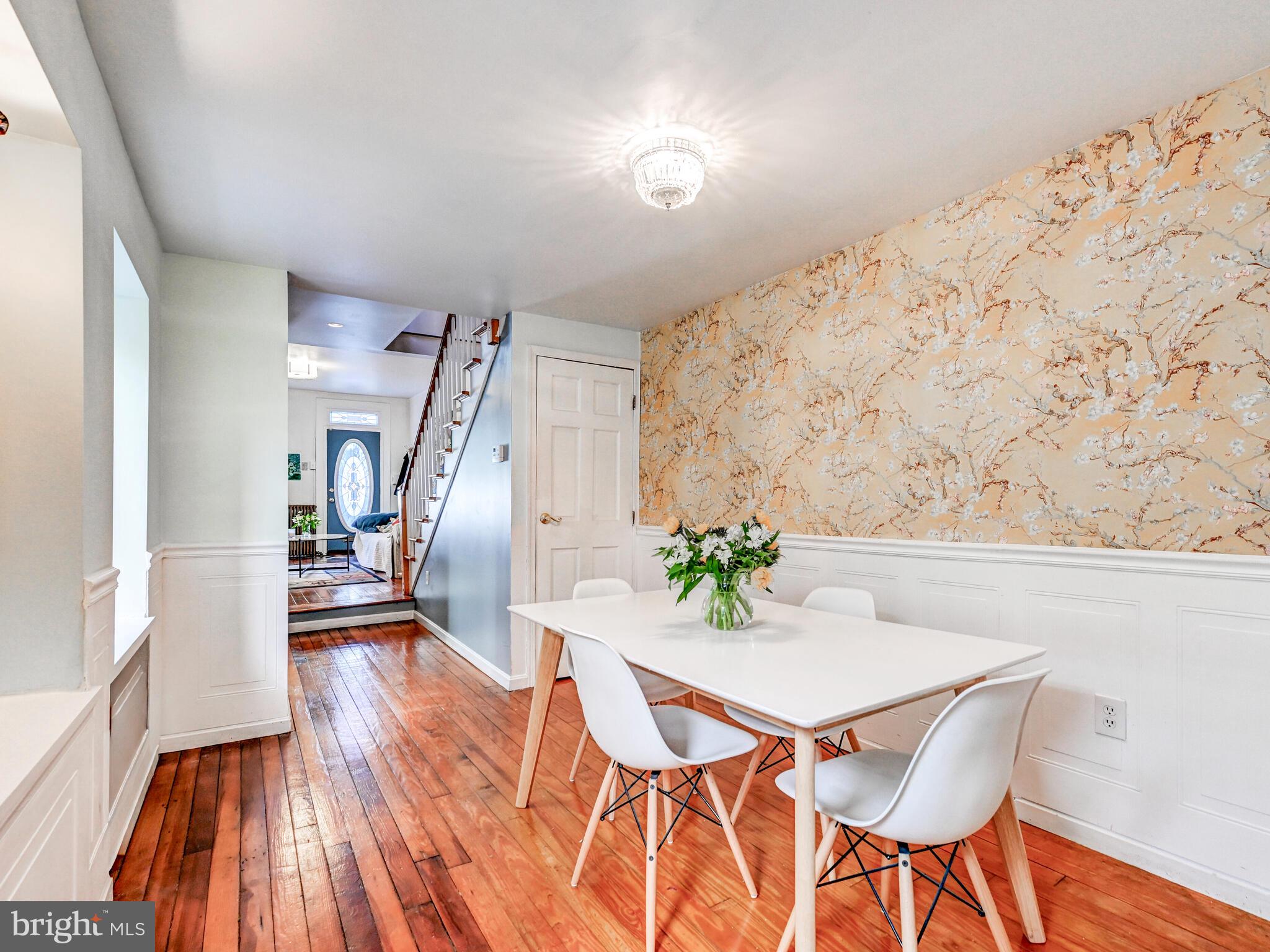 2013 Bank Street Baltimore, MD 21231 - Photo 10 of 38 a view of a dining room with furniture and wooden floor