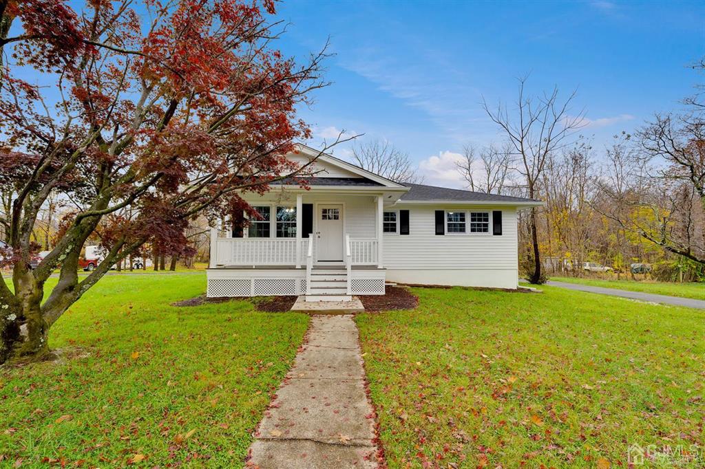 76 Old Road Princeton, NJ 08540 - Photo 1 of 33 a white house that has a big yard with wooden fence