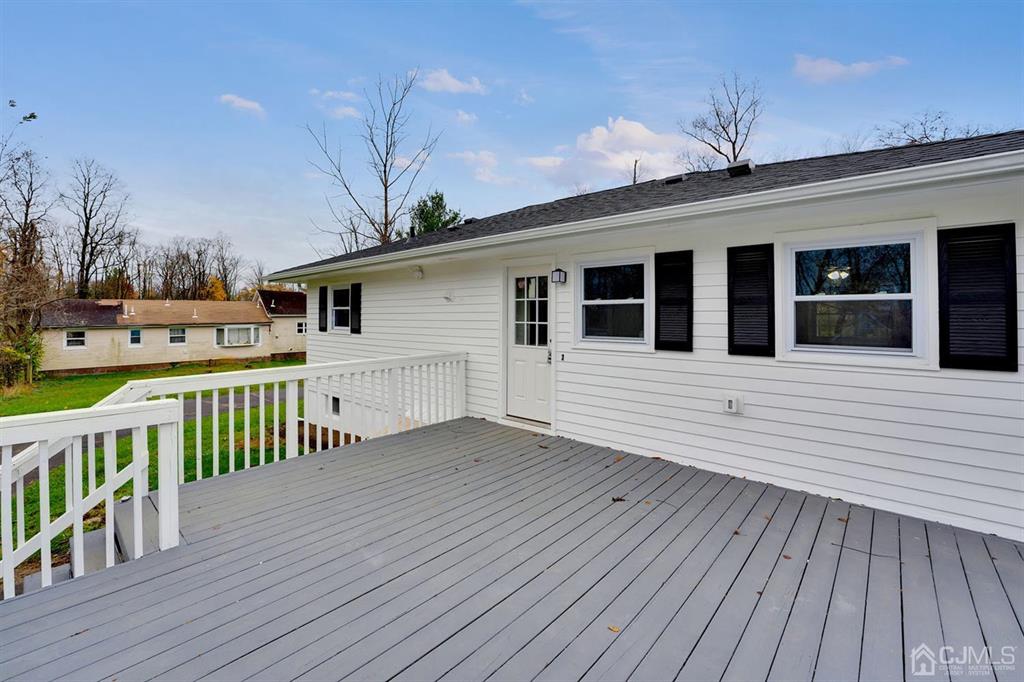 76 Old Road Princeton, NJ 08540 - Photo 22 of 33 a view of a house with wooden deck