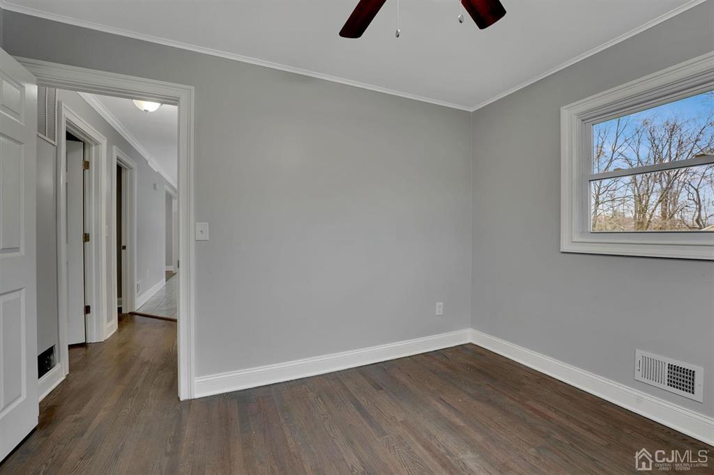 76 Old Road Princeton, NJ 08540 - Photo 6 of 33 wooden floor in an empty room with a window
