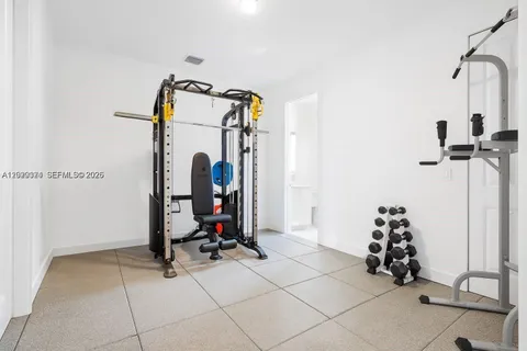 a view of storage and utility room with a cabinet