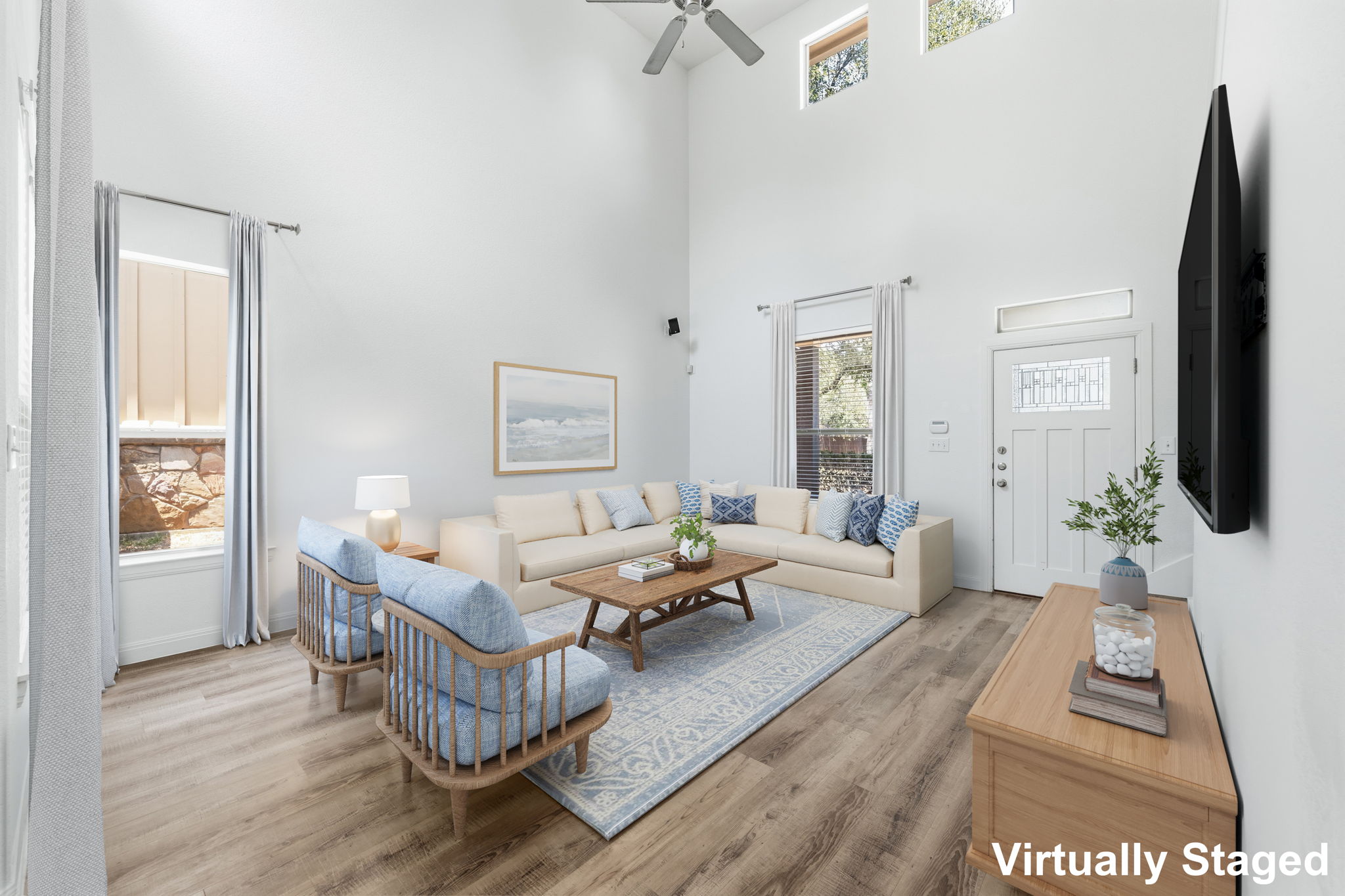 6708 Manchaca Road, Unit 4 Austin, TX 78745 - Photo 4 of 25 High ceilings and warm wood floors define this welcoming entry space.