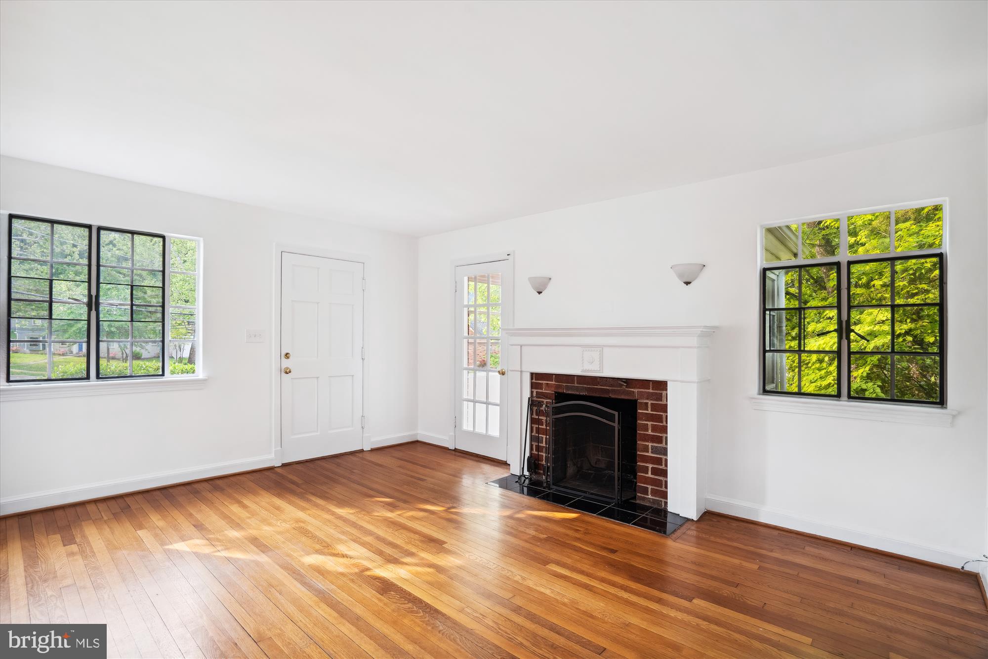5906 Forest Road Cheverly, MD 20785 - Photo 4 of 30 Living Room + door to sunroom
