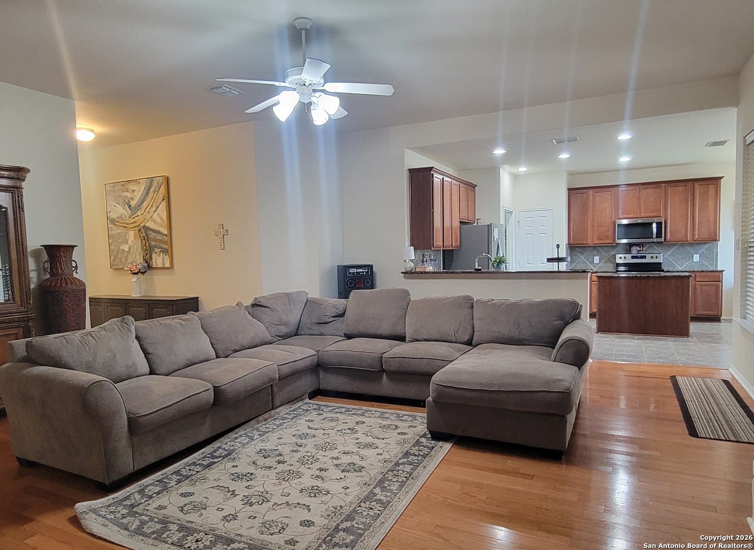 6113 Merion Way Schertz, TX 78108 - Photo 3 of 5 a living room with furniture and a couch