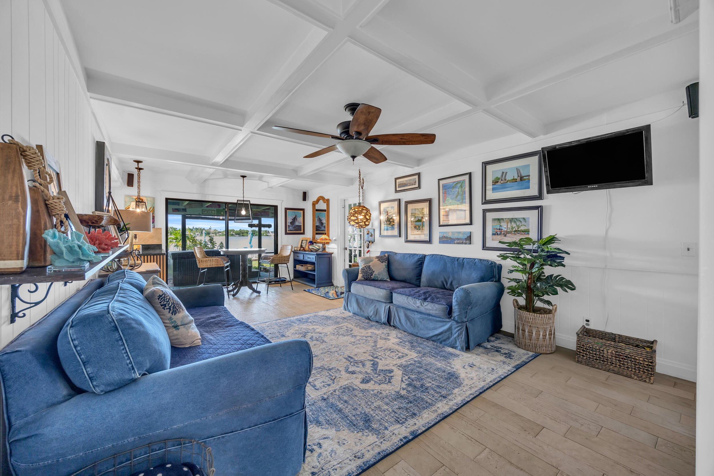 1305 Peninsular Road Jupiter, FL 33469 - Photo 18 of 46 a living room with furniture and a flat screen tv