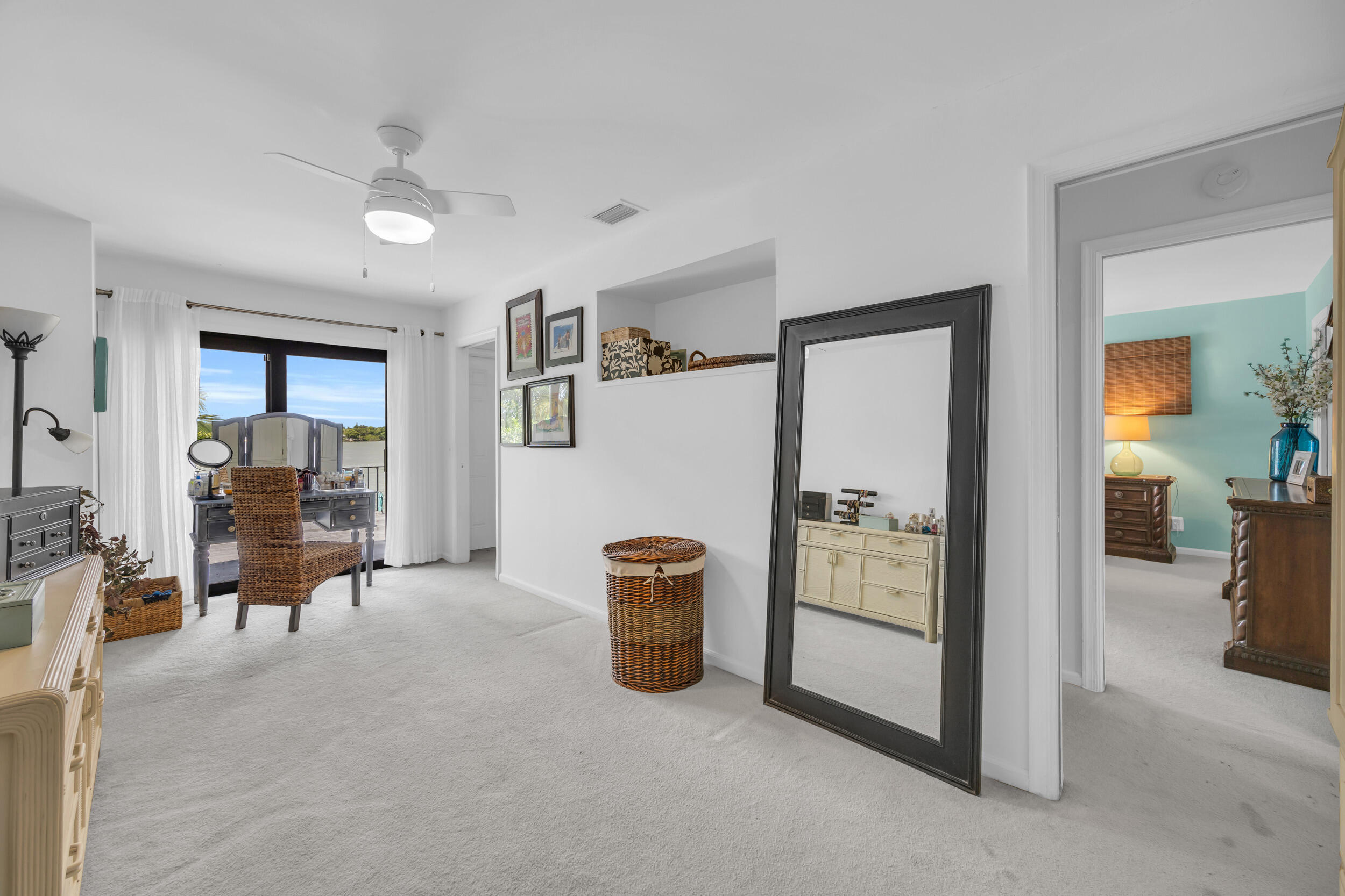 1305 Peninsular Road Jupiter, FL 33469 - Photo 33 of 46 a view of a livingroom with furniture and an entryway