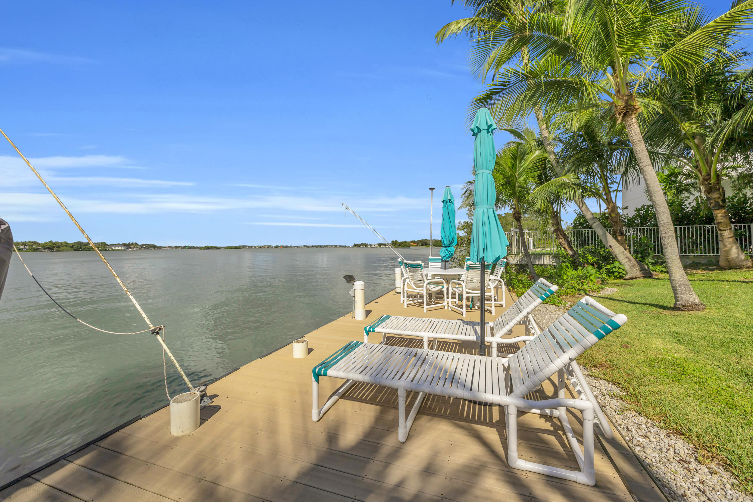 1305 Peninsular Road Jupiter, FL 33469 - Photo 38 of 46 a view of a swimming pool with a patio