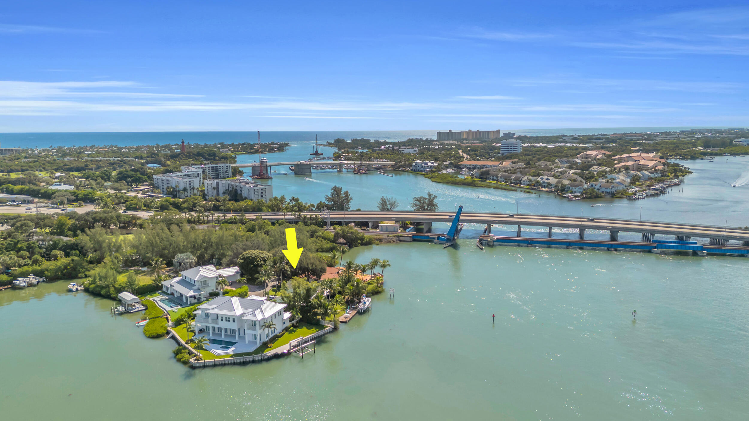 1305 Peninsular Road Jupiter, FL 33469 - Photo 42 of 46 an aerial view of a city with lawn chairs