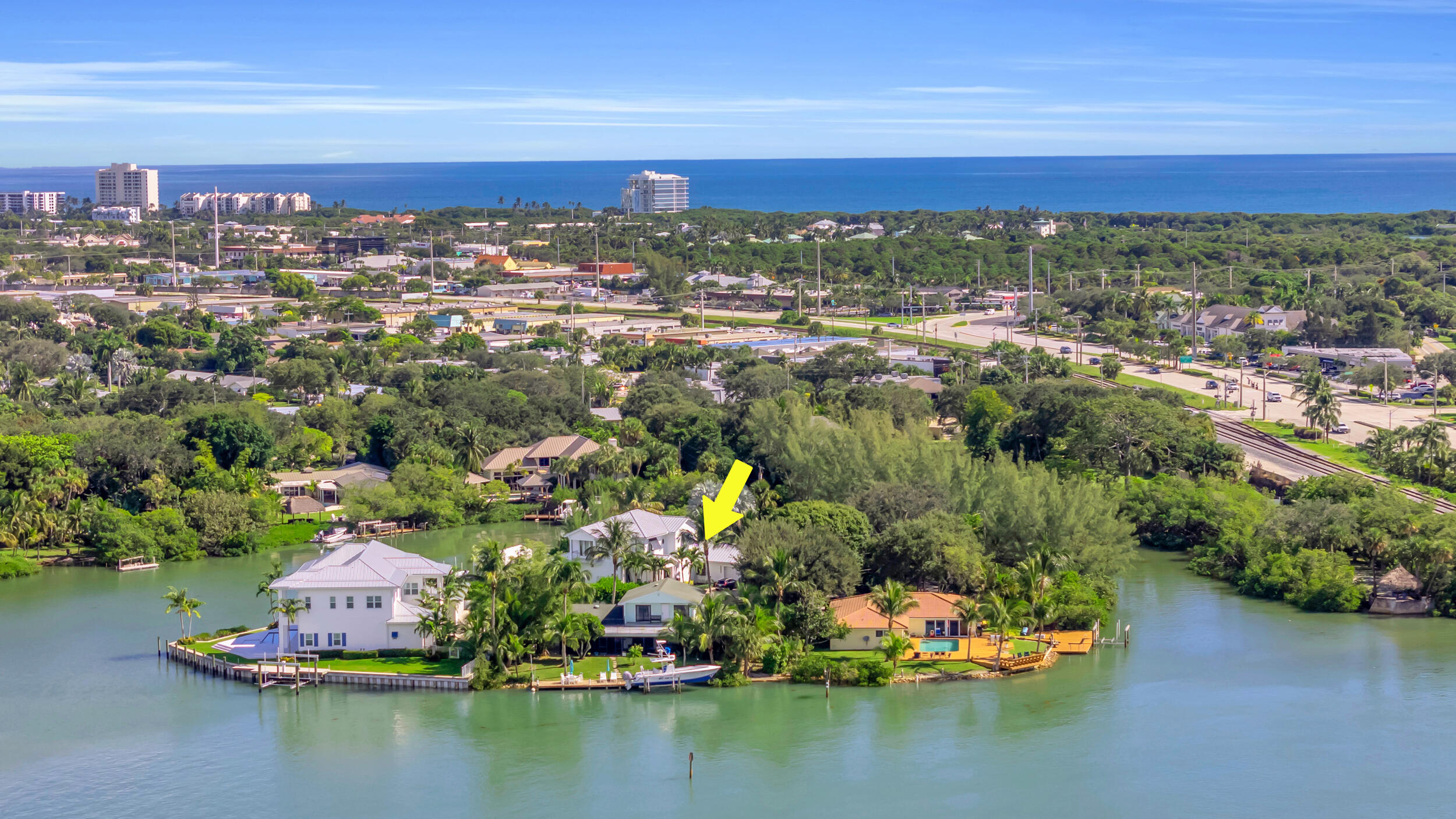1305 Peninsular Road Jupiter, FL 33469 - Photo 43 of 46 an aerial view of residential houses with outdoor space and swimming pool