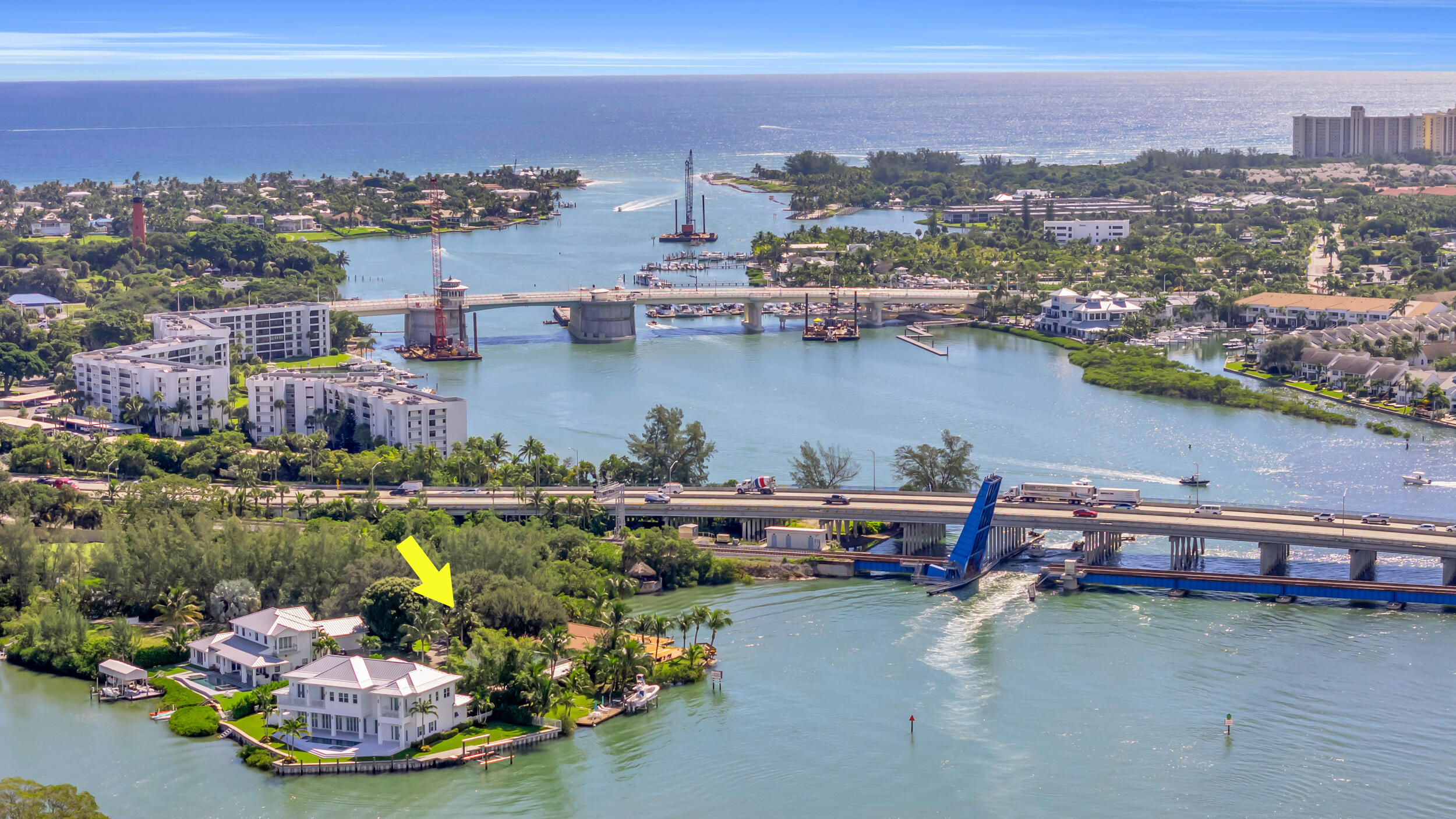 1305 Peninsular Road Jupiter, FL 33469 - Photo 45 of 46 a view of a lake with a city