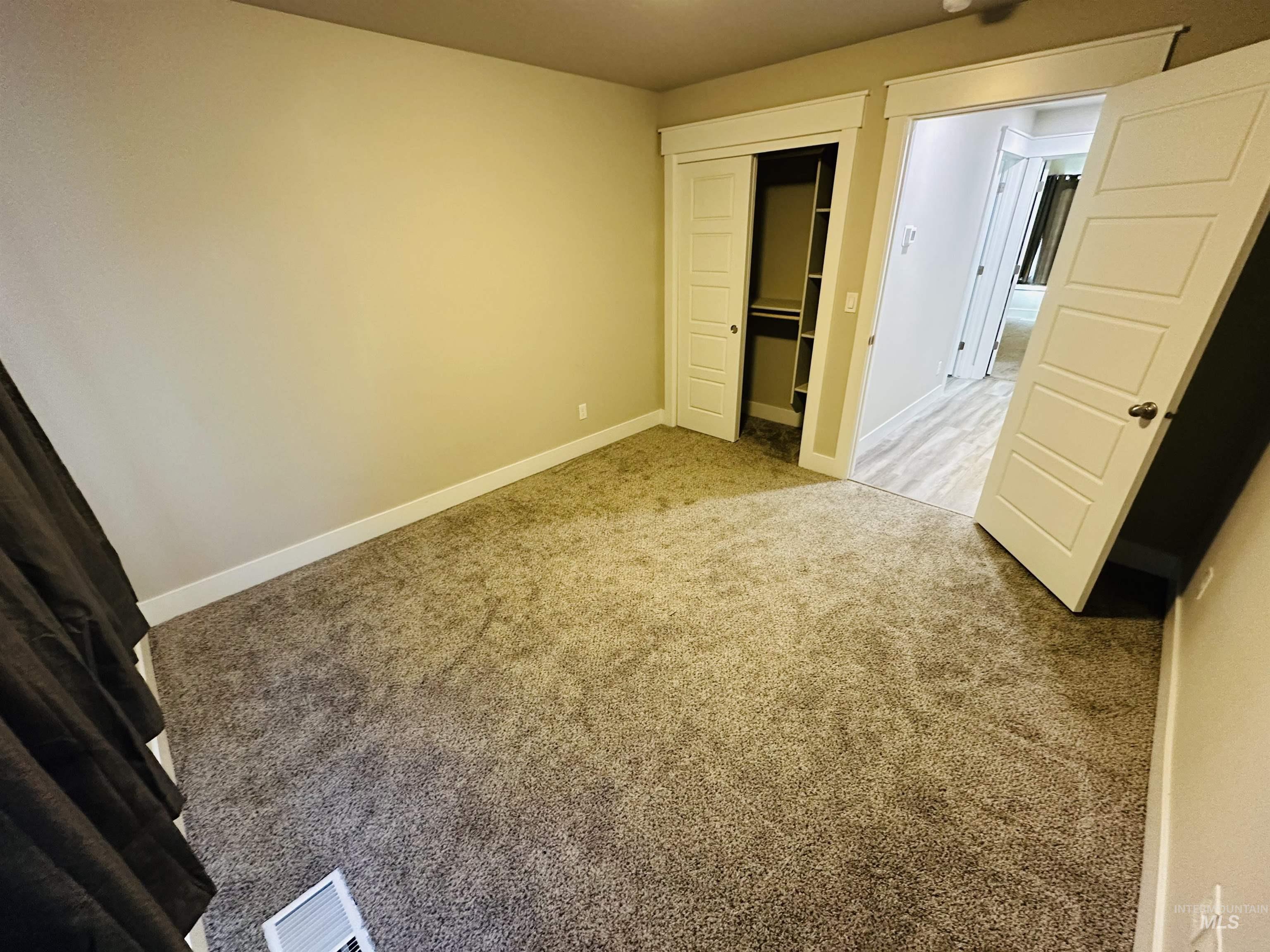911 Campbell Street Vale, OR 97918 - Photo 17 of 37 Unfurnished bedroom with carpet floors and a closet