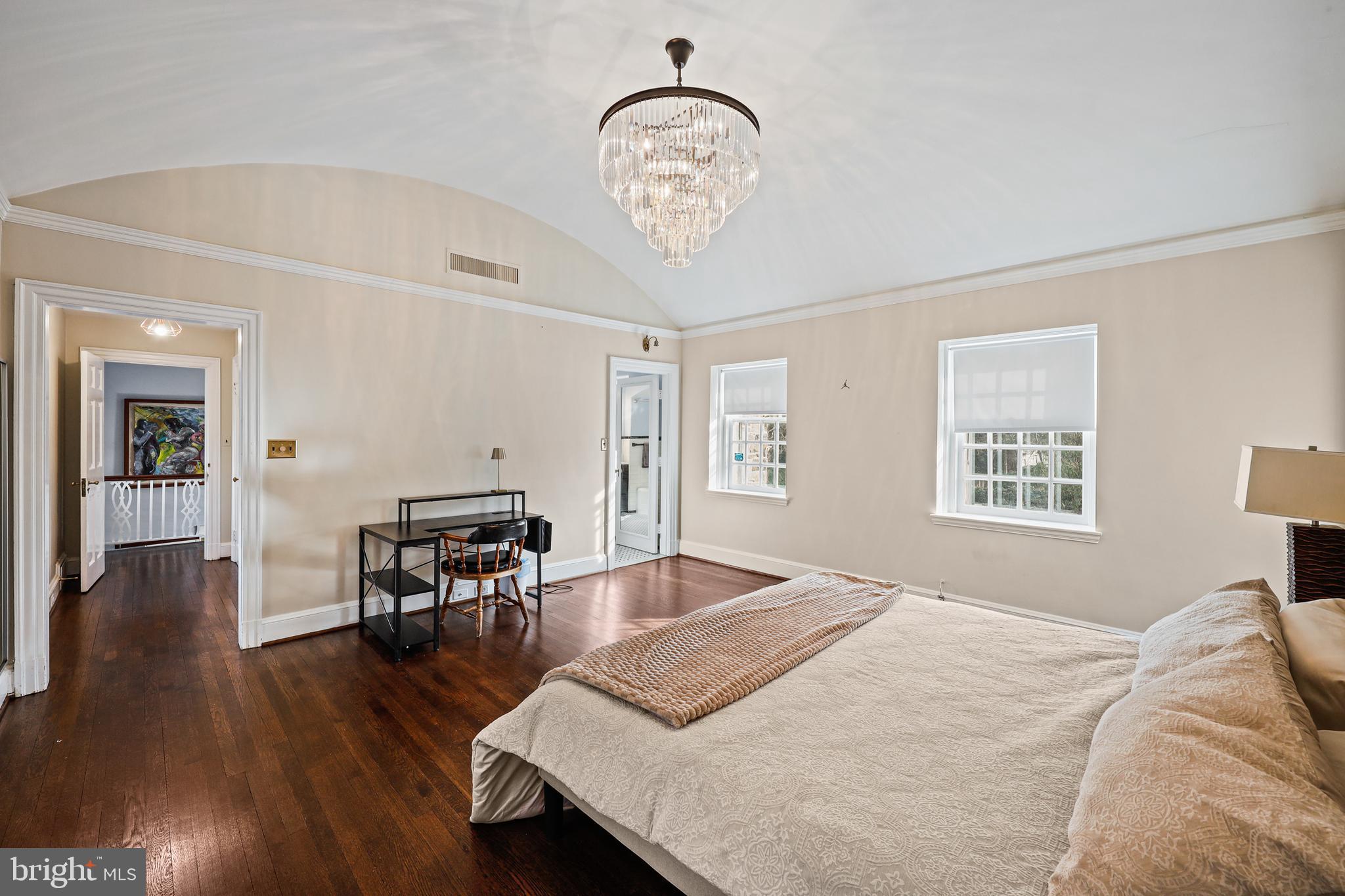 119 St Dunstans Road Baltimore, MD 21212 - Photo 25 of 54 a bedroom with a bed and a table in it