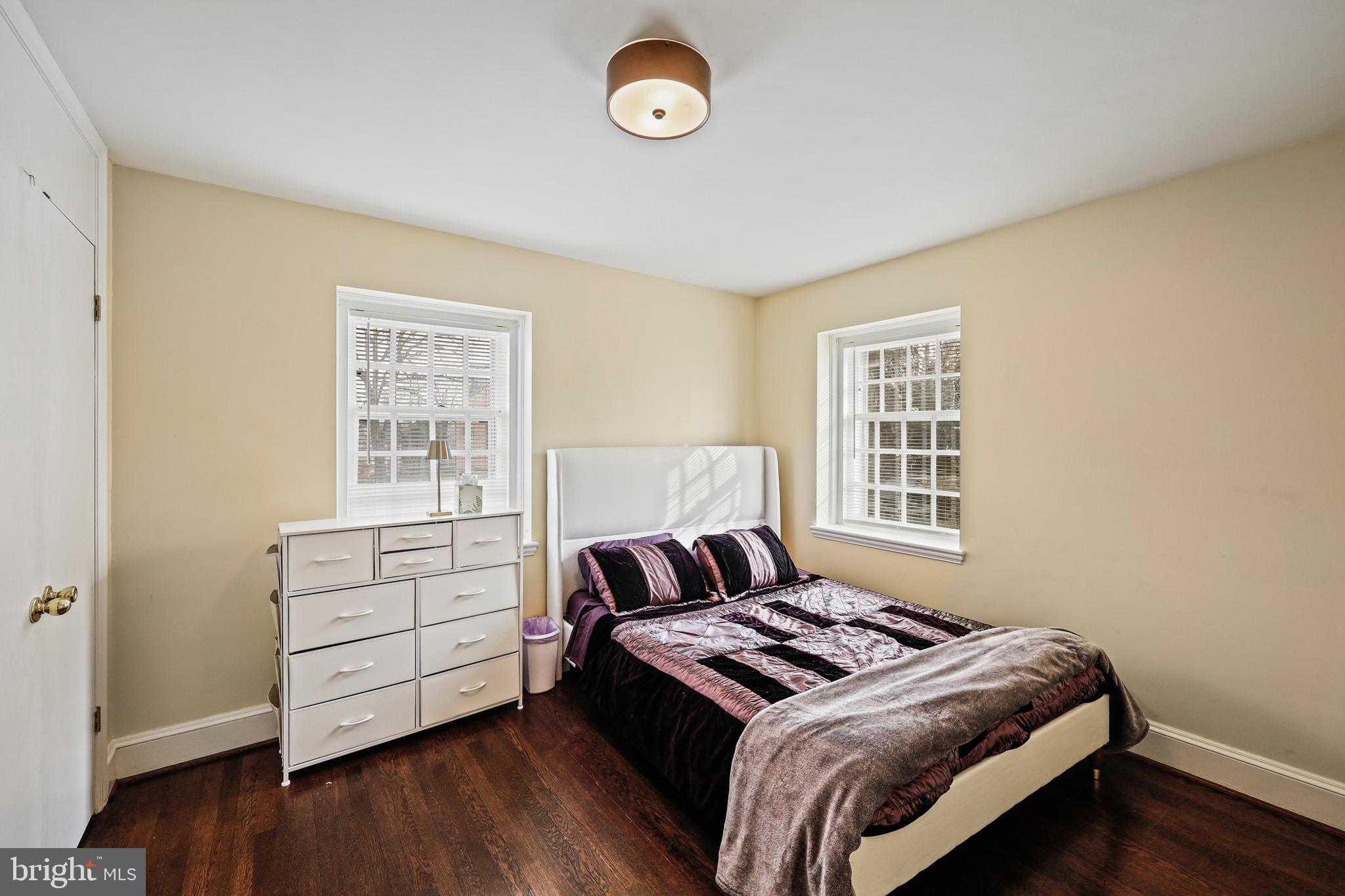 119 St Dunstans Road Baltimore, MD 21212 - Photo 34 of 54 a bedroom with a bed and a window