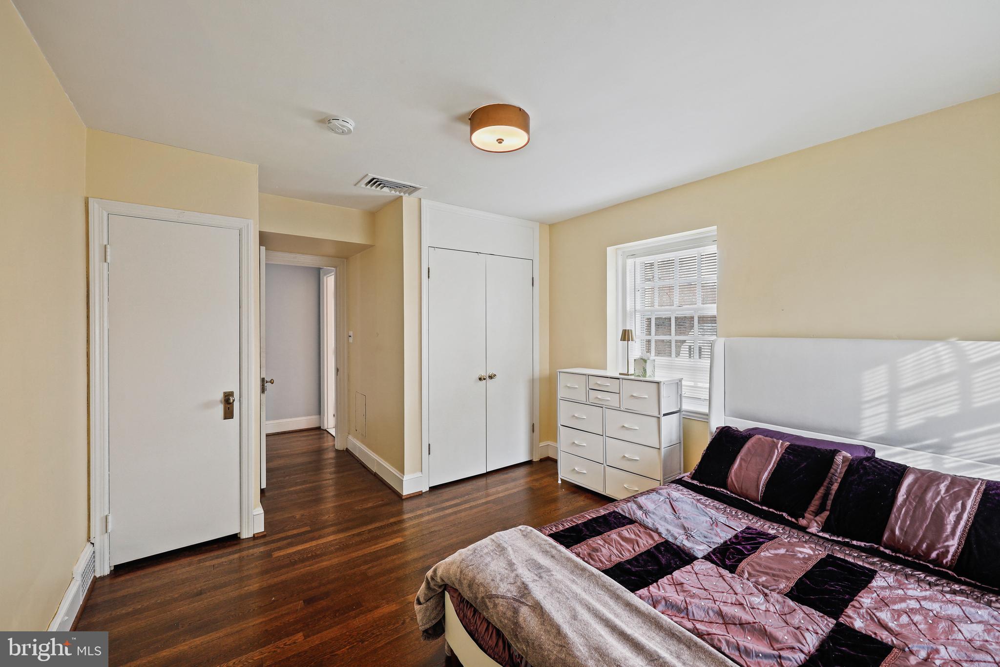 119 St Dunstans Road Baltimore, MD 21212 - Photo 35 of 54 a bedroom with furniture and wooden floor