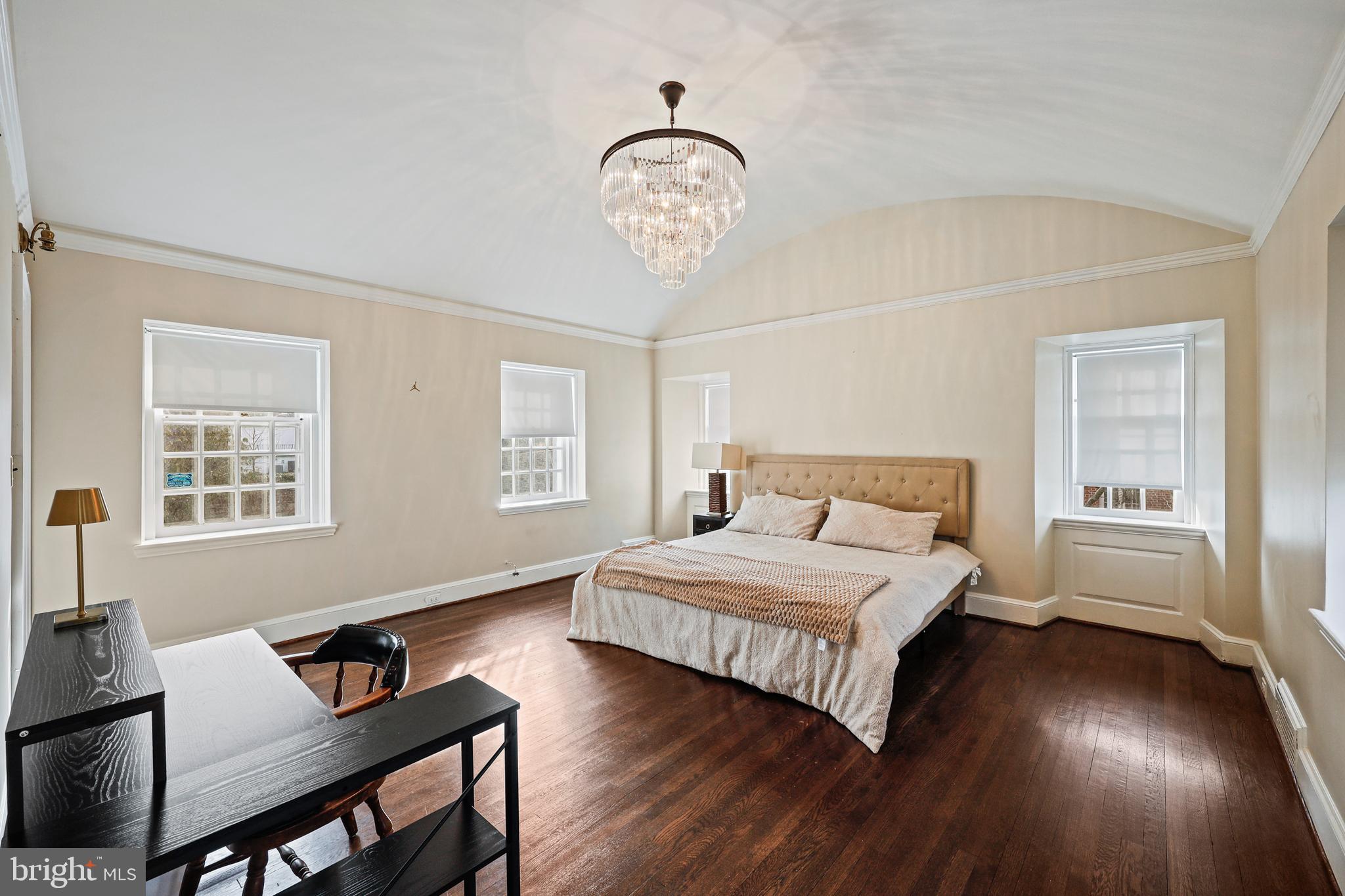 119 St Dunstans Road Baltimore, MD 21212 - Photo 4 of 54 a bedroom with a bed and a window