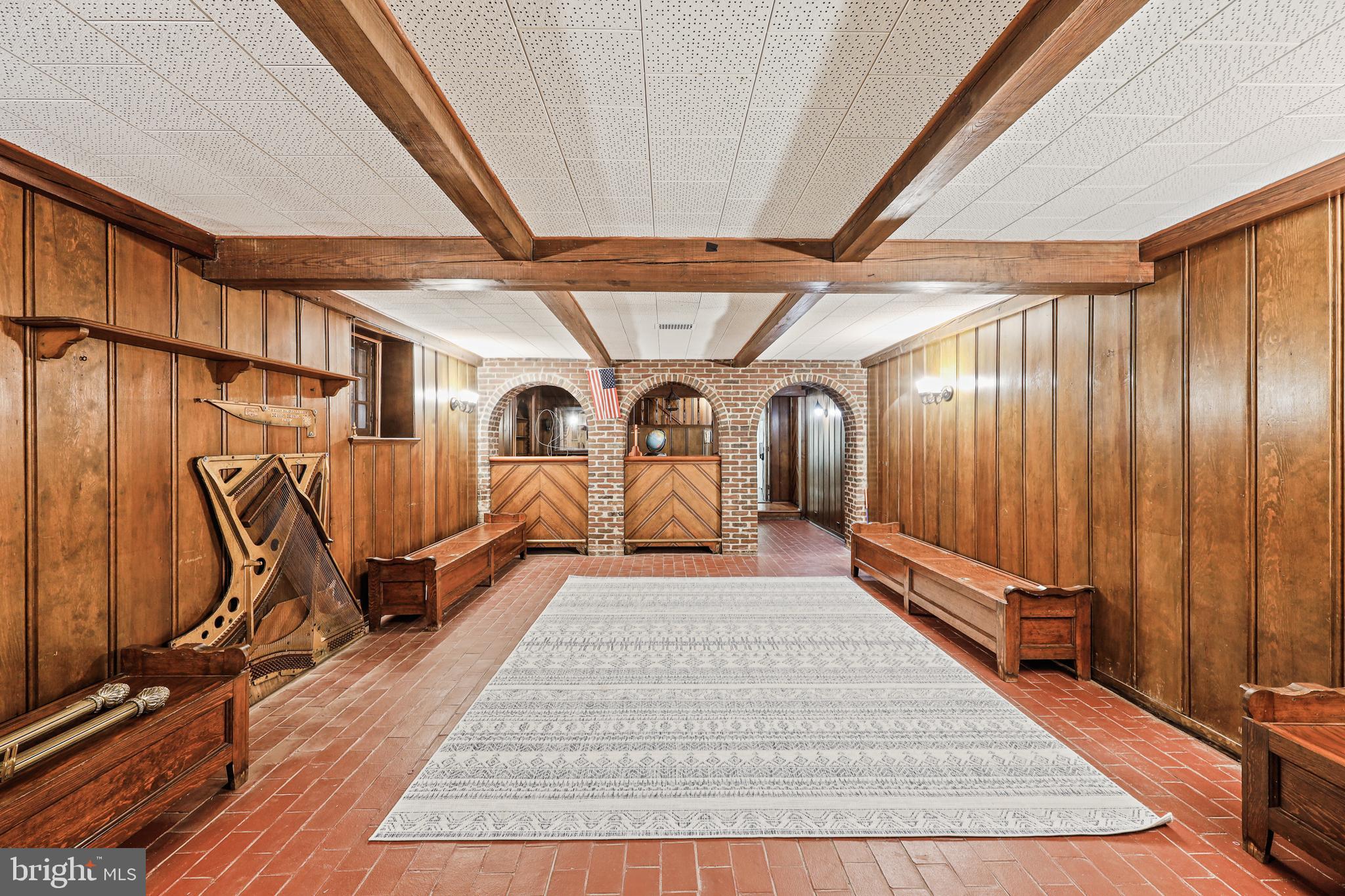 119 St Dunstans Road Baltimore, MD 21212 - Photo 47 of 54 a view of a hall with wooden floor and furniture