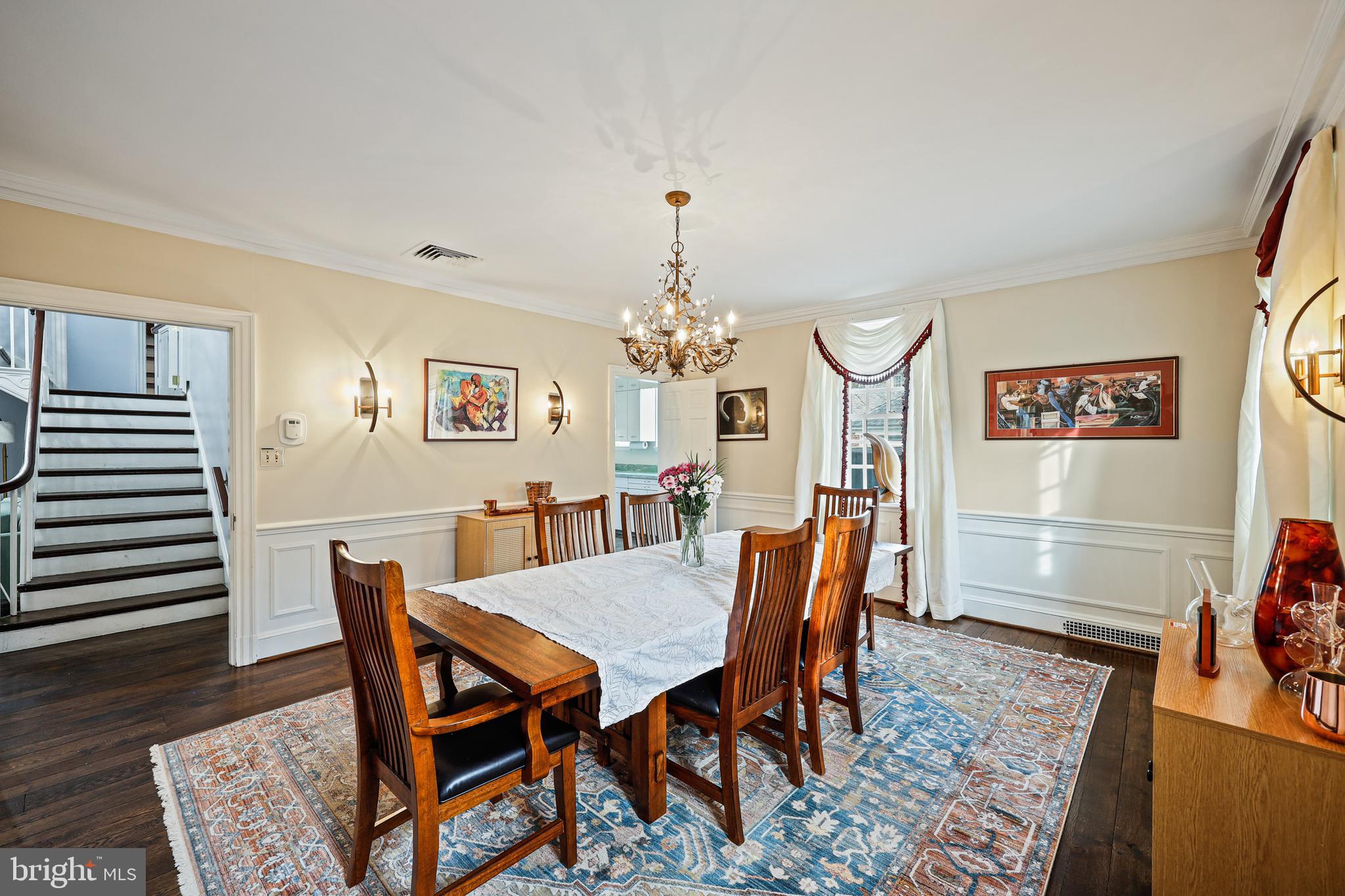 119 St Dunstans Road Baltimore, MD 21212 - Photo 9 of 54 a view of a dining room with furniture and wooden floor