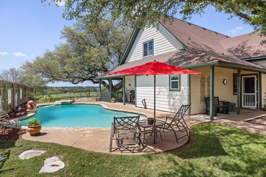 1311 Williamson Road Granbury, TX 76048 - Photo 12 of 40 an outdoor space with swimming pool and furniture