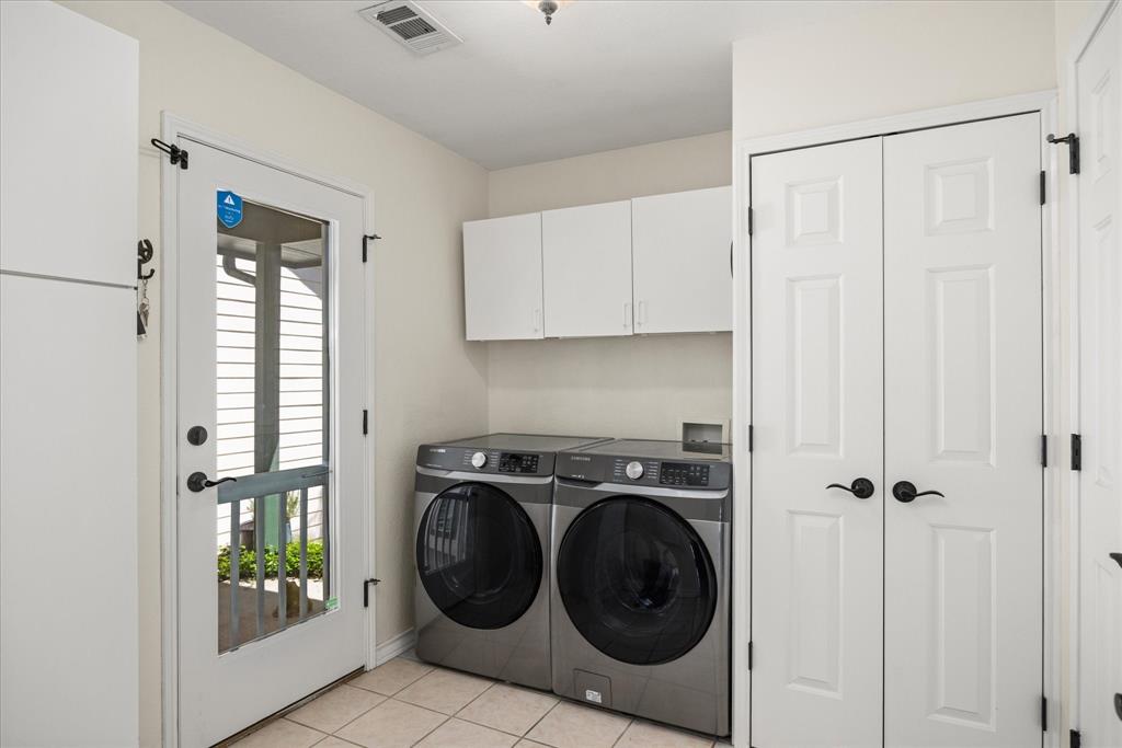 1311 Williamson Road Granbury, TX 76048 - Photo 25 of 40 a utility room with sink dryer and washer