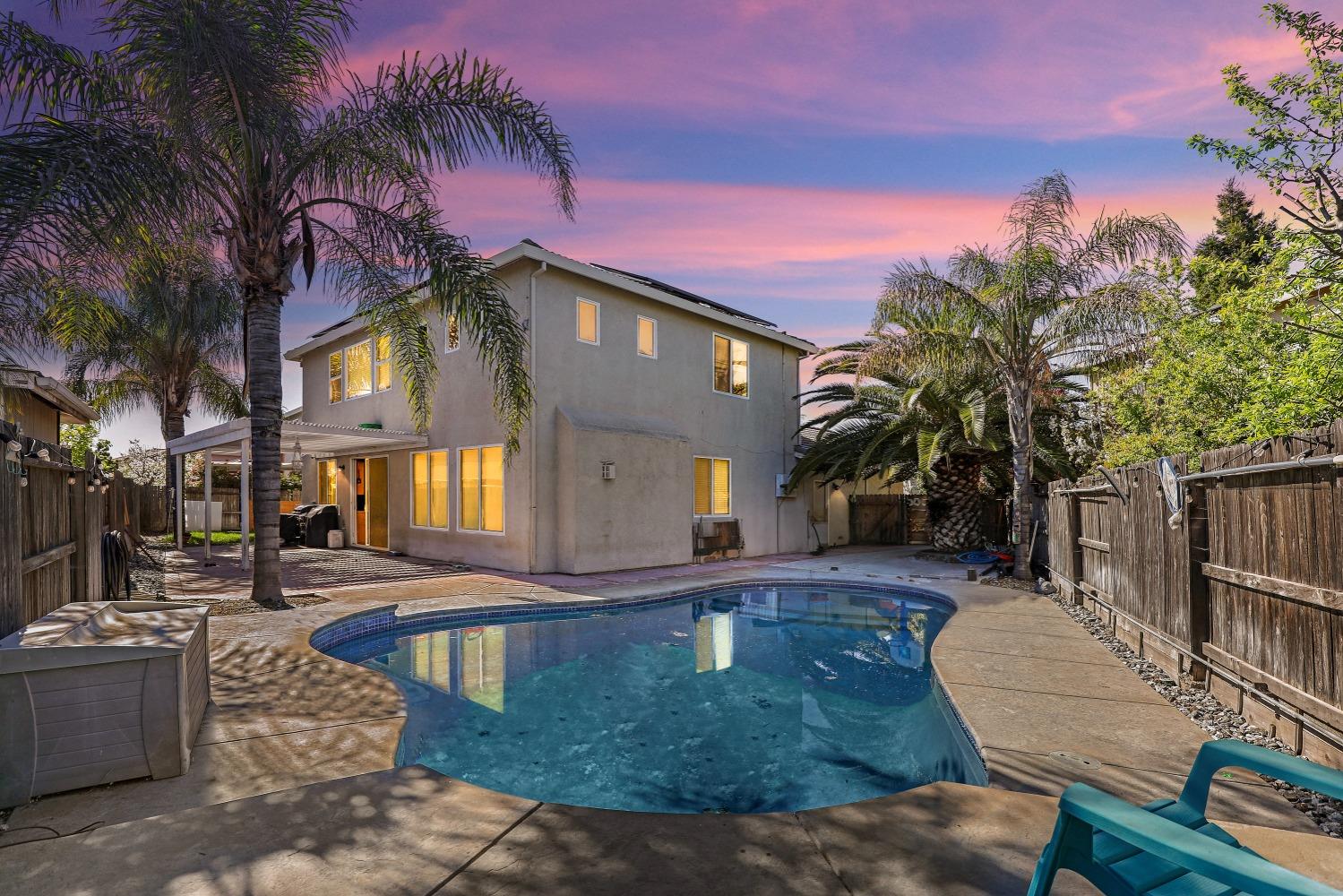 1908 Bright Star Place Stockton, CA 95209 - Photo 1 of 1 a front view of a house with a yard