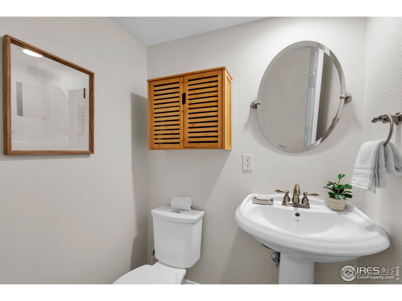 4636 Devonshire Street Boulder, CO 80301 - Photo 17 of 40 a bathroom with a sink and mirror