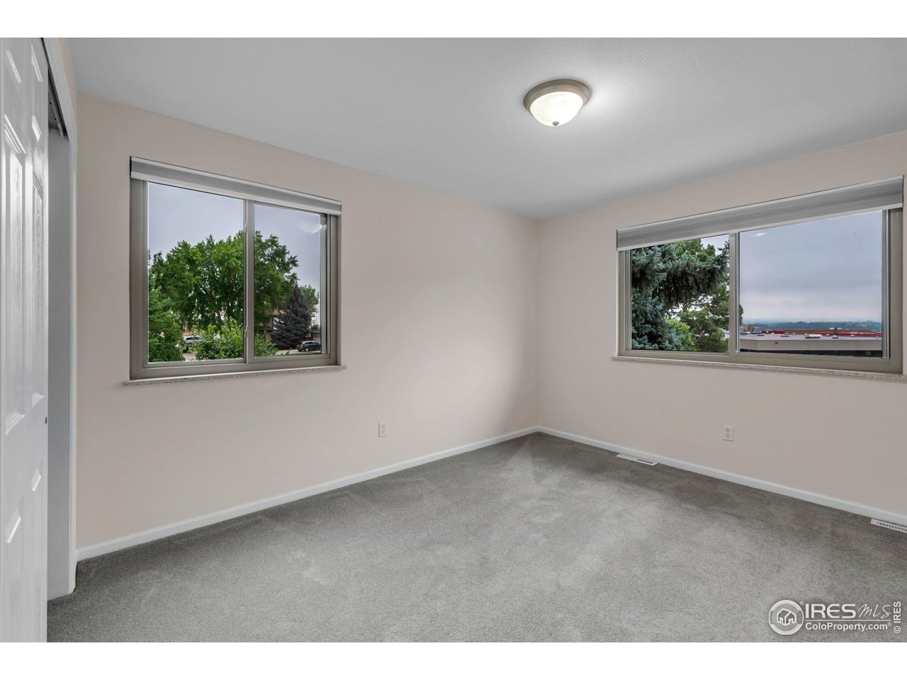4636 Devonshire Street Boulder, CO 80301 - Photo 23 of 40 a view of an empty room with a window