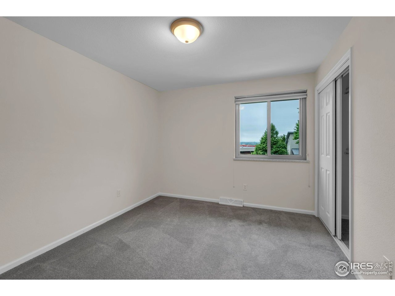 4636 Devonshire Street Boulder, CO 80301 - Photo 26 of 40 a view of an empty room with a window