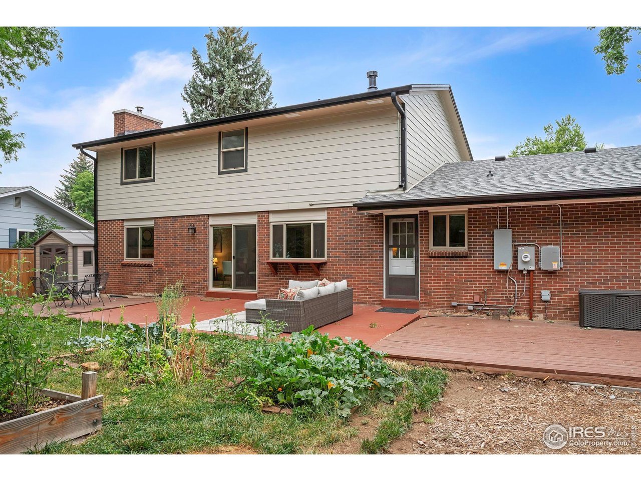 4636 Devonshire Street Boulder, CO 80301 - Photo 33 of 40 a front view of a house with patio