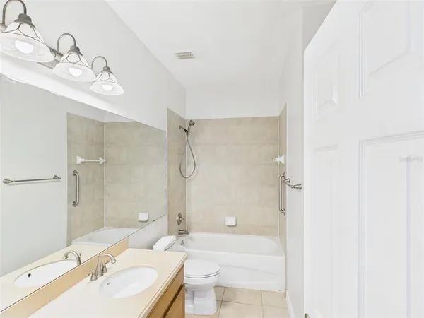 a view of storage and utility room with washer and dryer