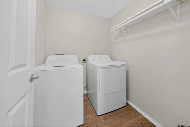 a utility room with dryer and washer