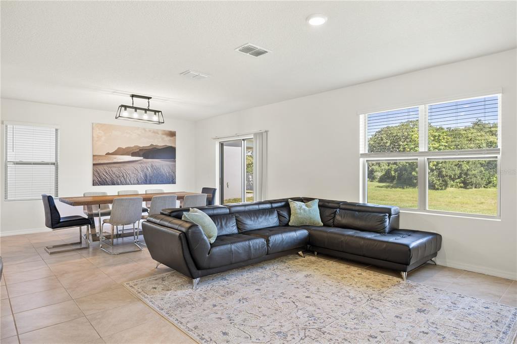 3090 Timber Hawk Circle Ocoee, FL 34761 - Photo 16 of 54 a living room with furniture and a window