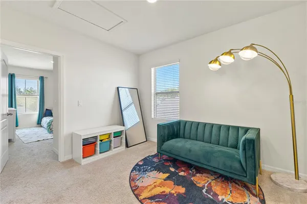 a bedroom with a bed and a cabinets