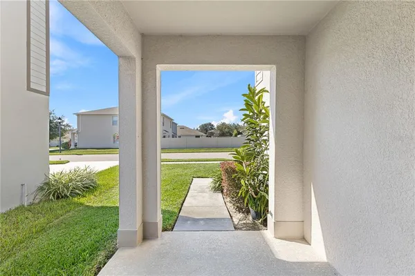 a view of entryway with wooden floor