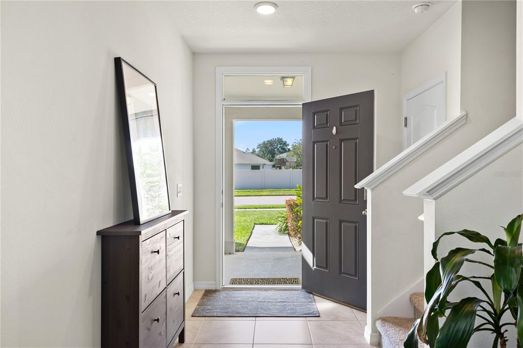 3090 Timber Hawk Circle Ocoee, FL 34761 - Photo 4 of 54 a view of entryway with wooden floor